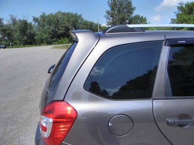 Спойлер "Чистое стекло" на крышку багажника Лада Калина 2 (универсал) в цвет кузова