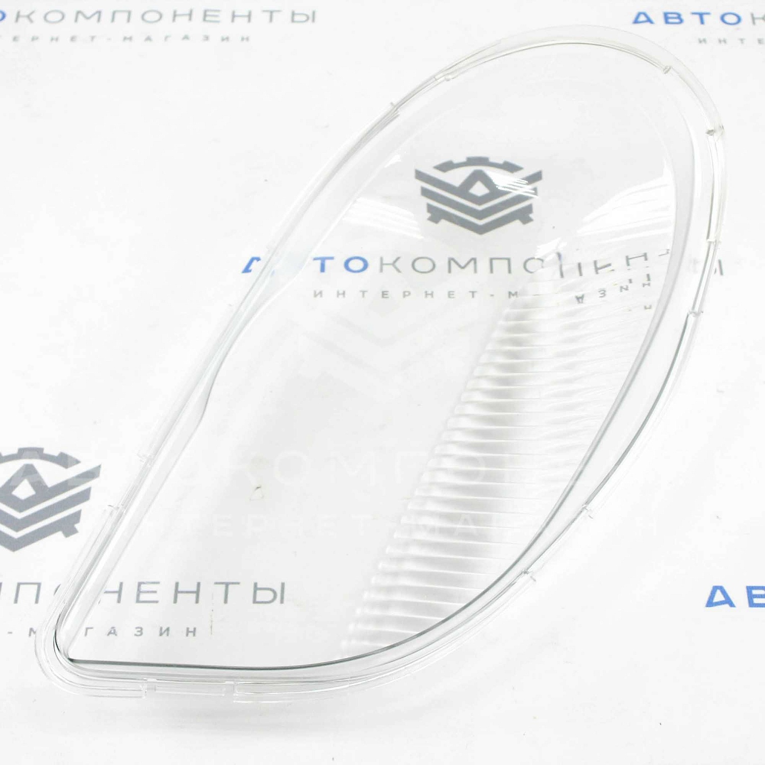 Стекло (пластик) фары нового образца Шевроле Нива (левое)